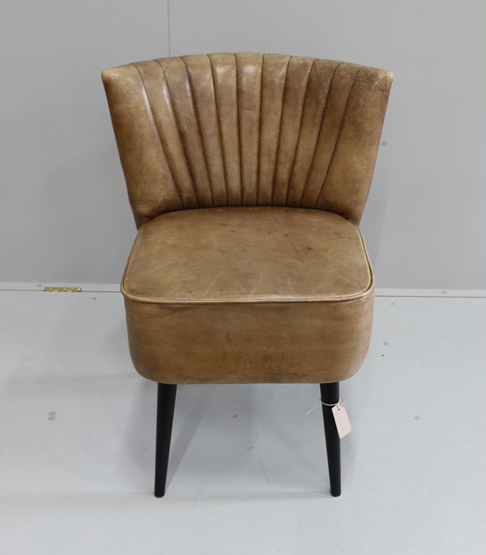 A 1950's upholstered side chair, width 60cm, depth 64cm, height 78cm